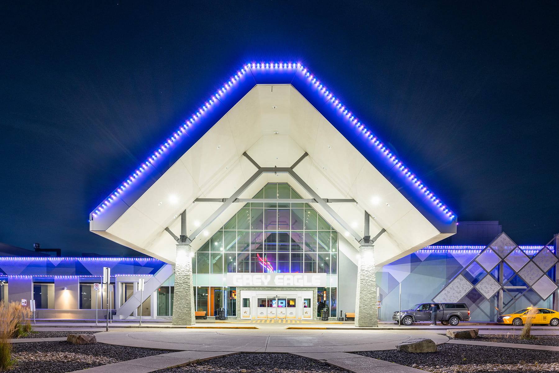 Entrance canopy lit blue with Gemstone lights
