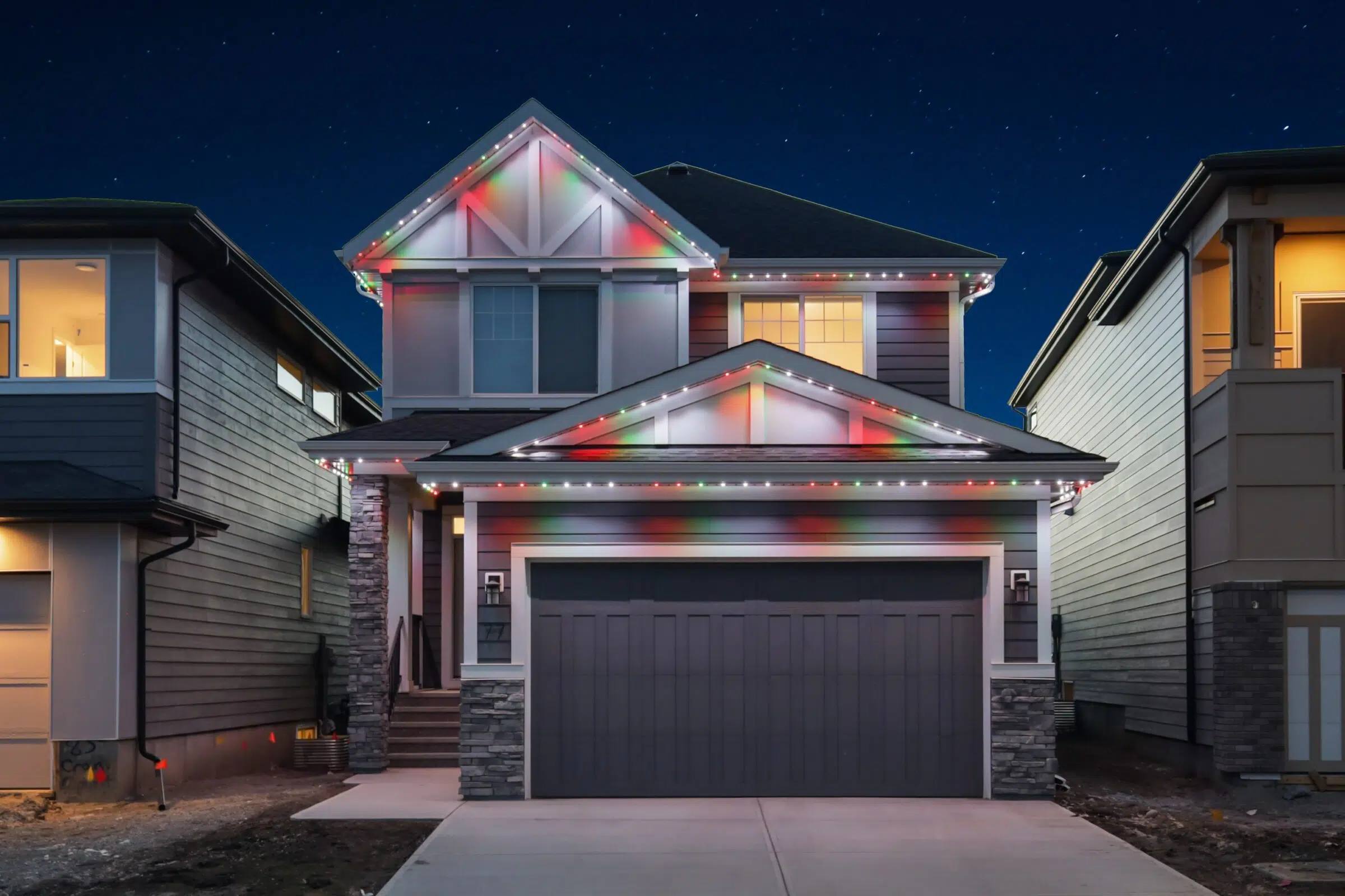 The same home with red, green and white Gemstone Christmas lights