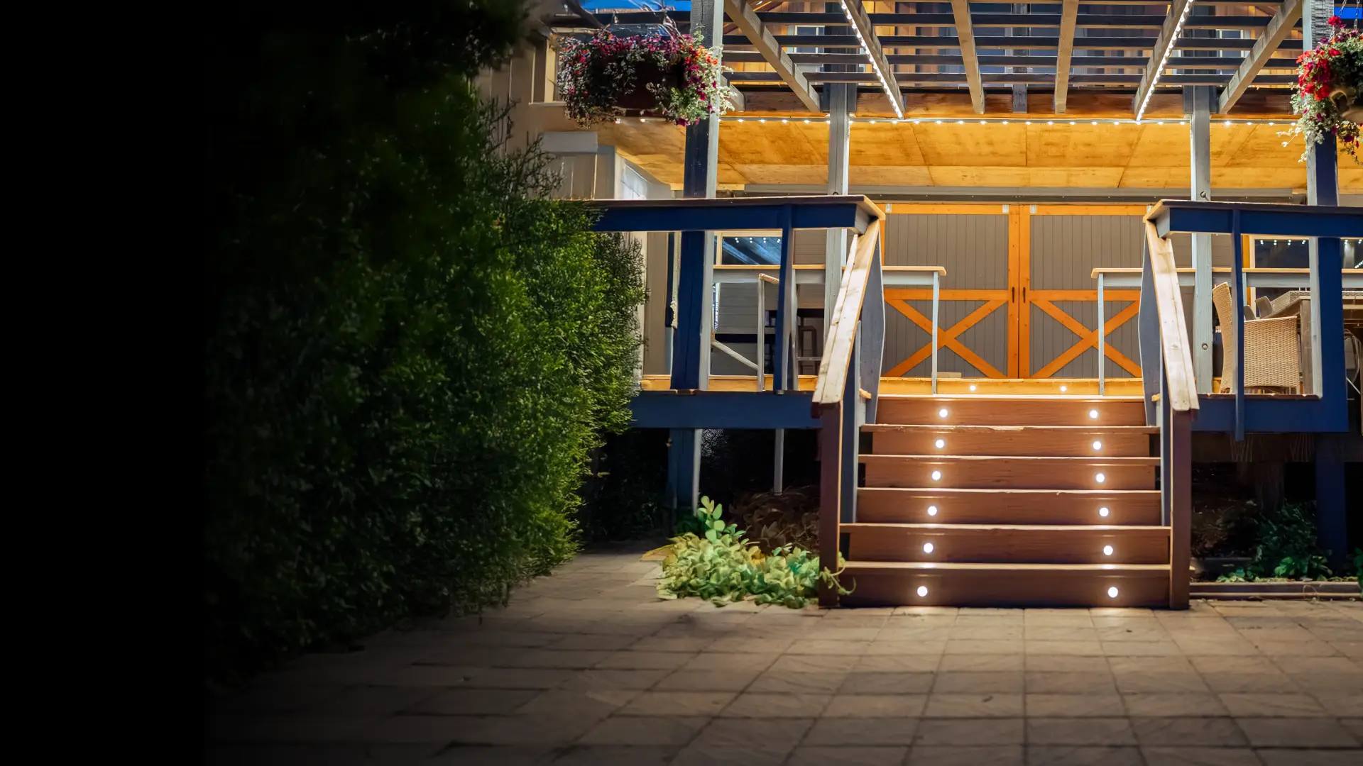 Deck stairs and pergola with warm white Gemstone deck lights