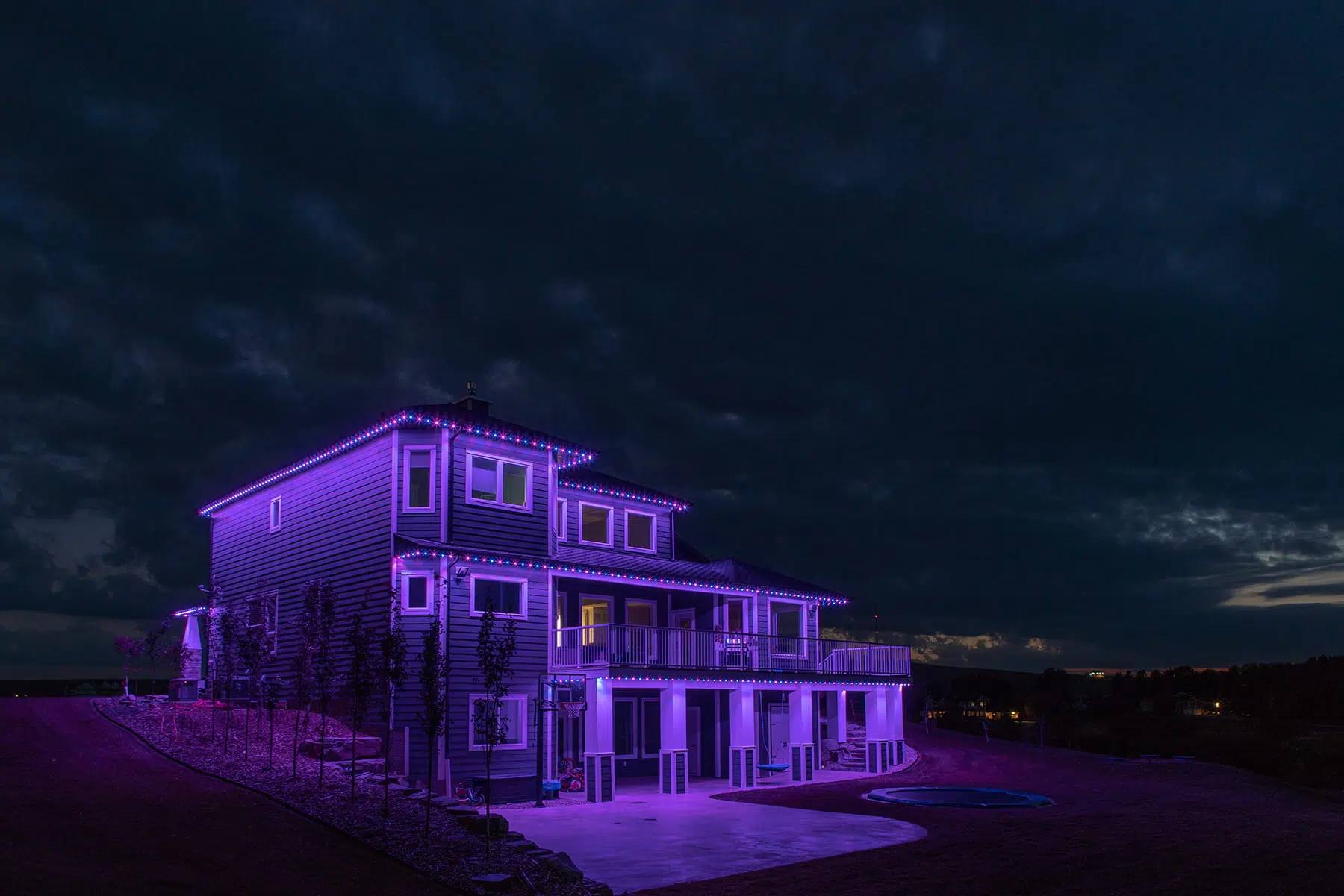 Three-storey home lit purple for Halloween
