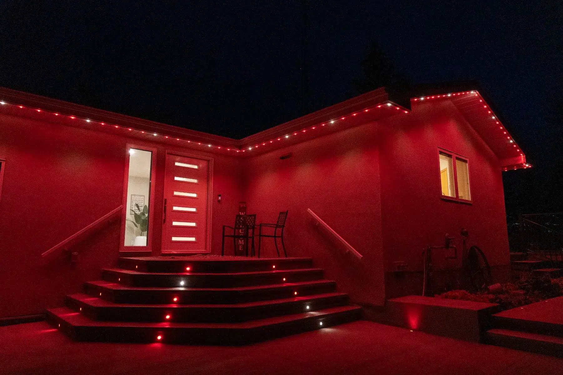The same steps and house lit red