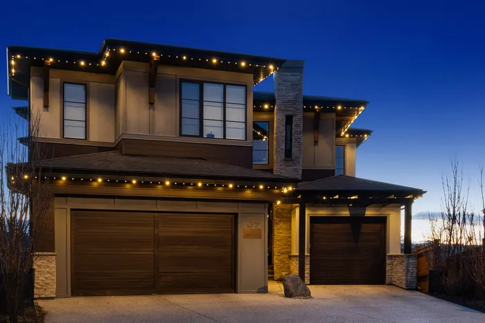 Home at night outlined in warm white Gemstone lights