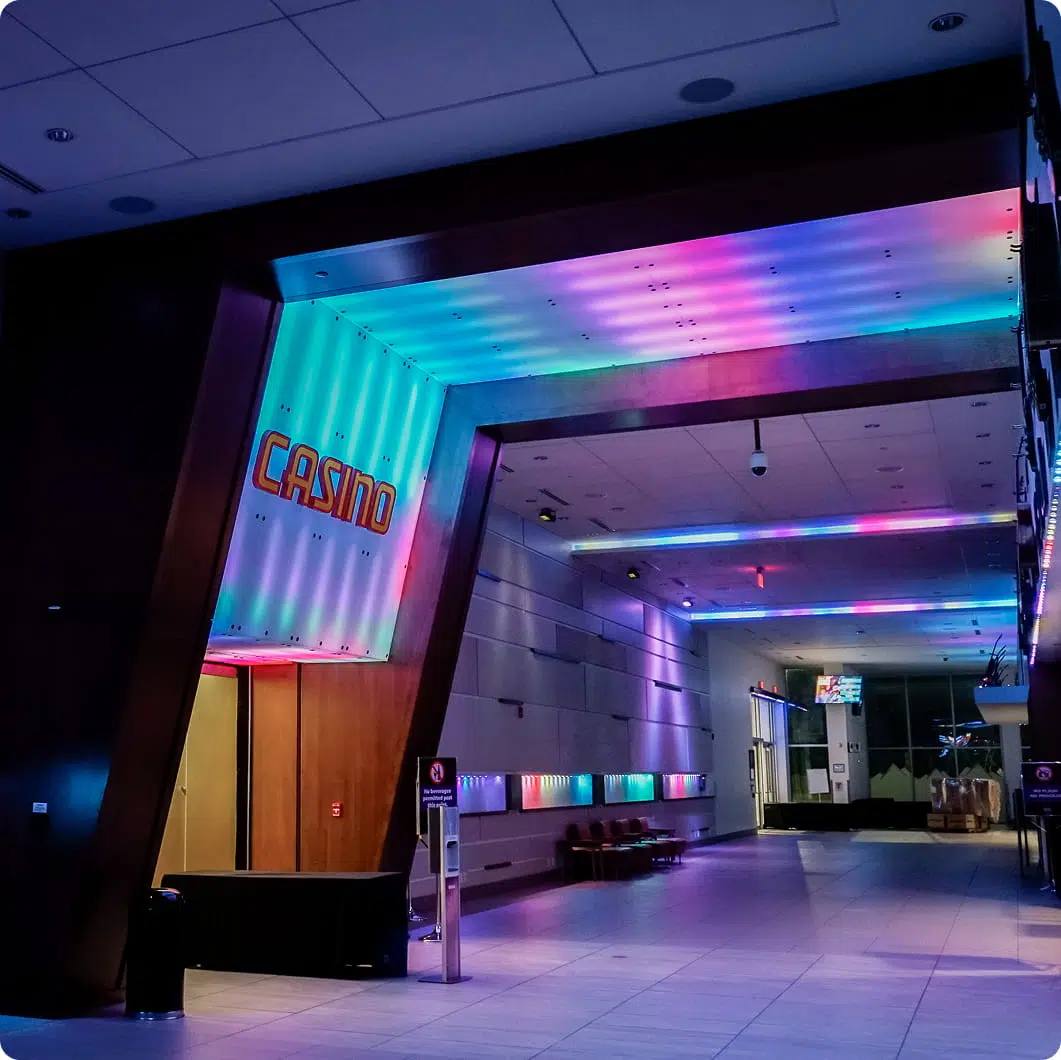Gemstone strip lights glowing under a counter