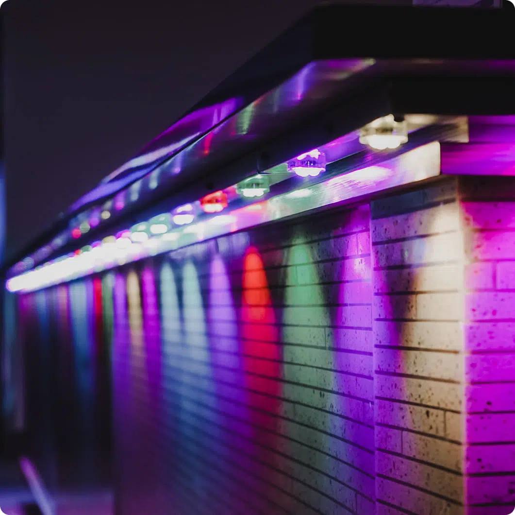 Gemstone indoor track lights along a ceiling