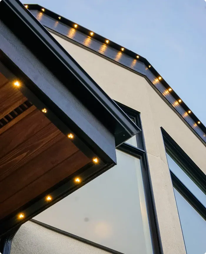 Colour-matched Gemstone track with warm white lights under a soffit