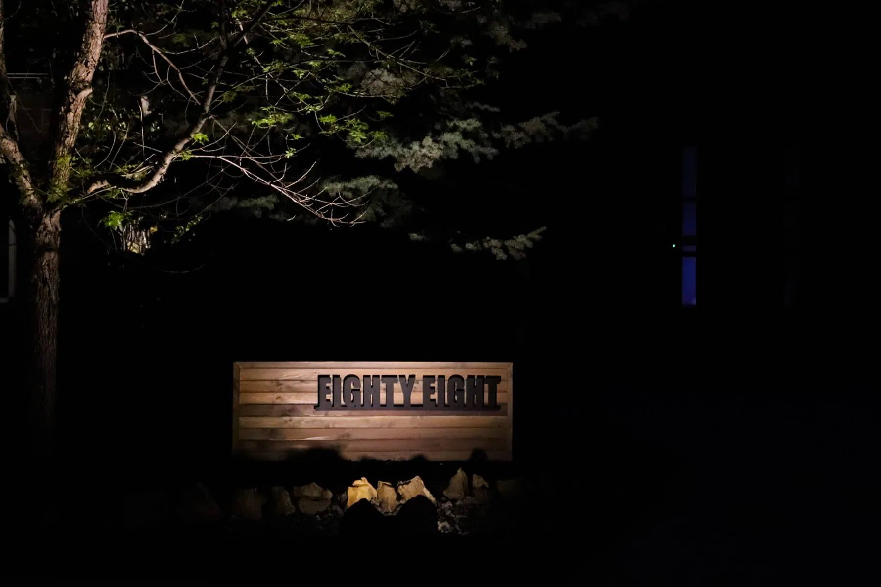 Wooden sign lit by a Gemstone flood light